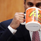 WASHINGTON, DC - DECEMBER 14: Federal Communications Commission Chairman Ajit Pai drinks from a big coffee cup during a commission meeting December 14, 2017 in Washington, DC. The FCC is scheduled to vote on a proposal to repeal net-neutrality.